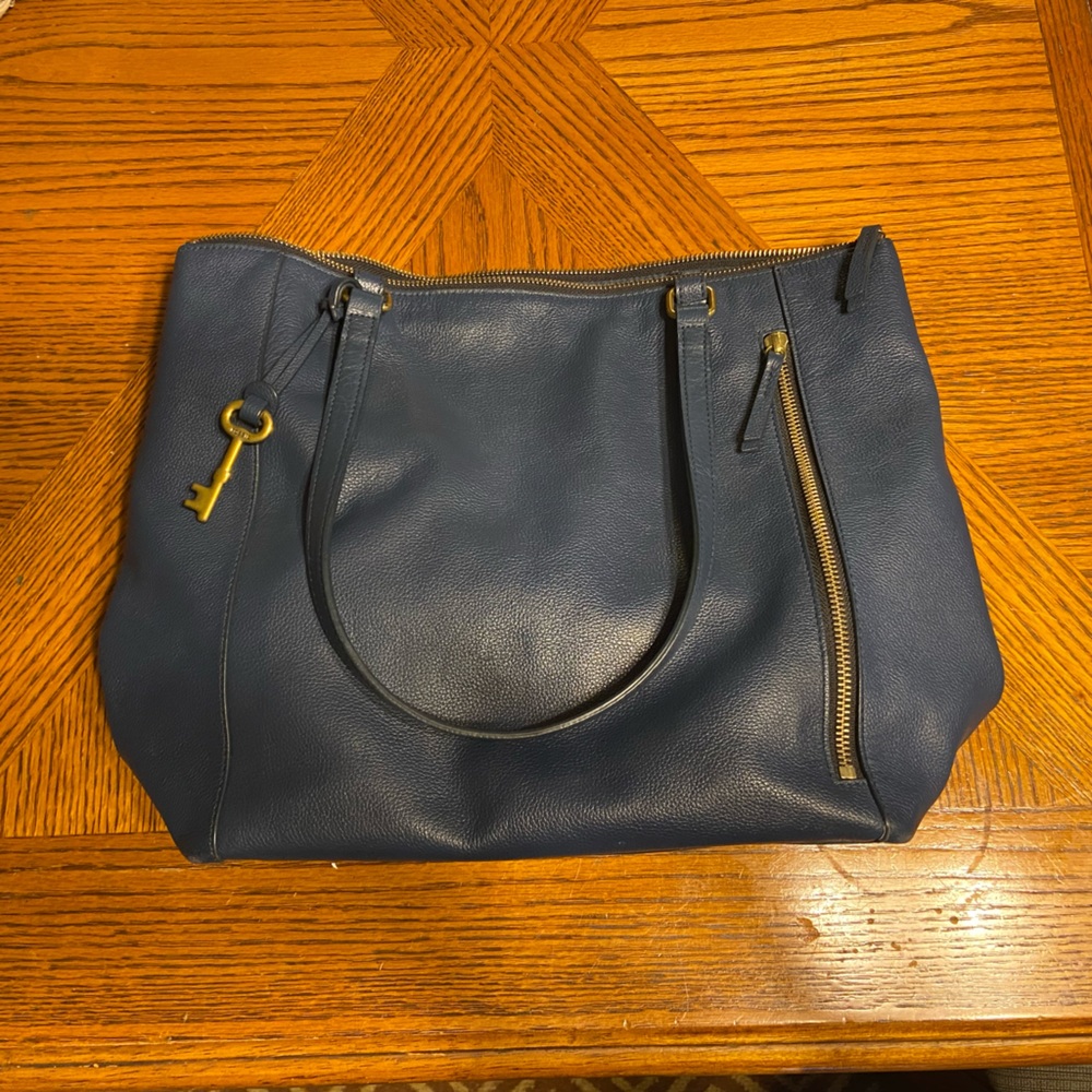 Beautiful deep blue fossil leather handbag